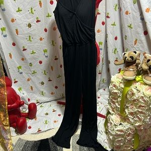 Bebe black jumpsuit with Bebe Crystal on back